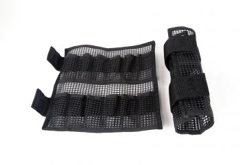 A pair of black mesh gloves with velcro straps.