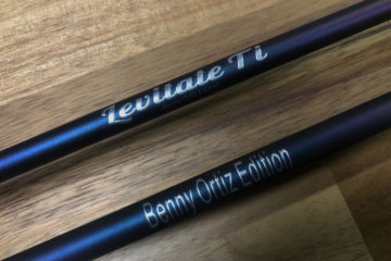 A pair of black rods with the words " keany ortiz edition ".