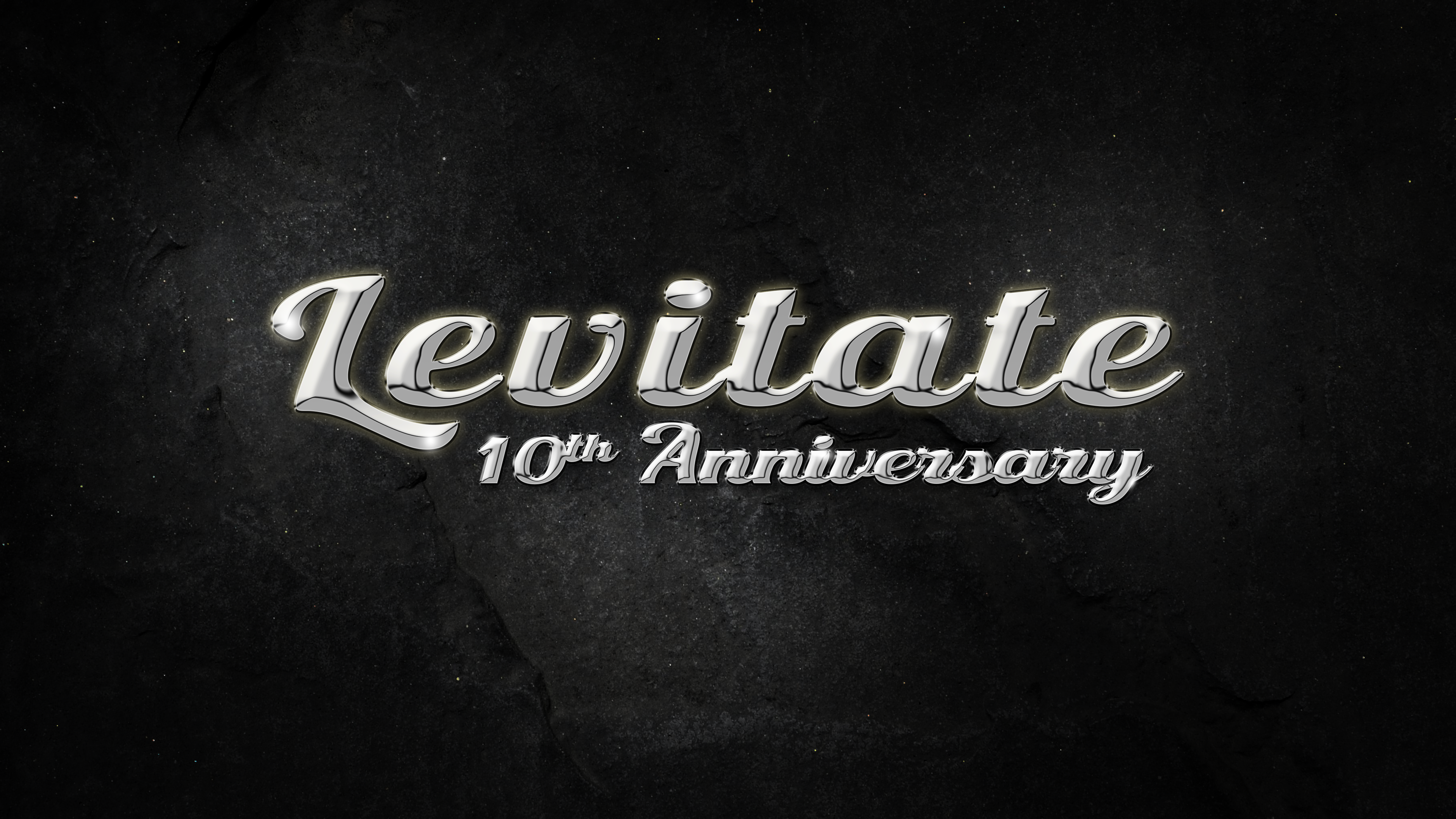 A black background with levitate 1 0 th anniversary written in silver.
