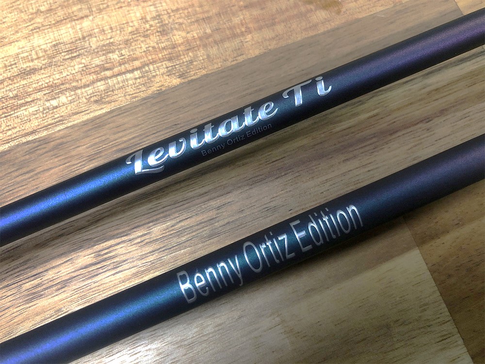 Two pens with the names of different people.
